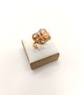 Neutral glass bead cluster ring